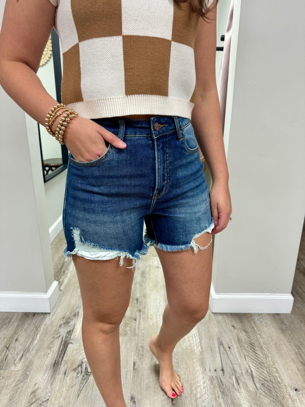 High Rise Side Step Hem Shorts